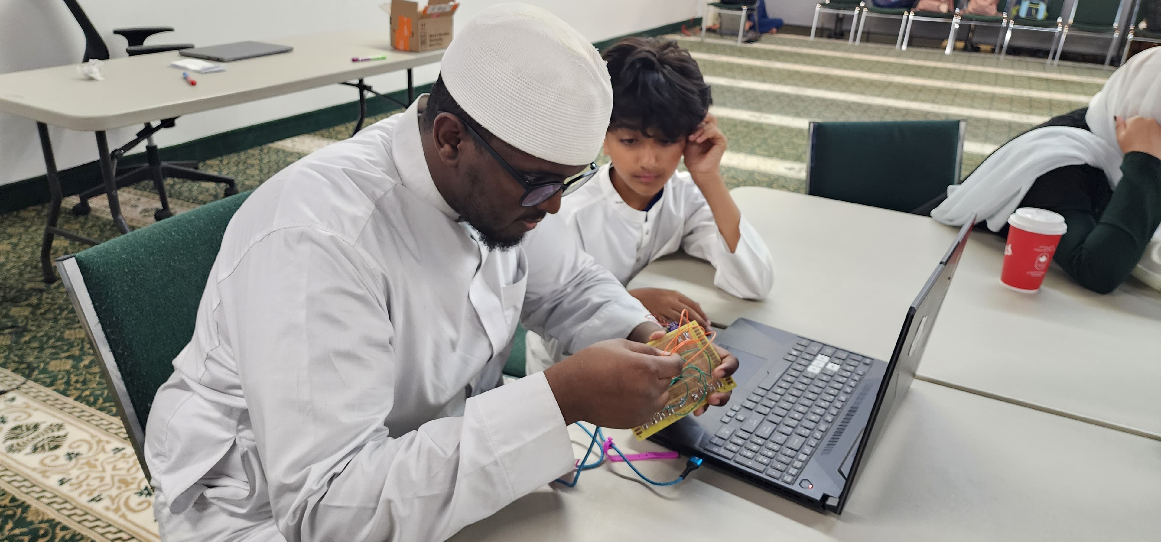 Students building a project during the pilot run